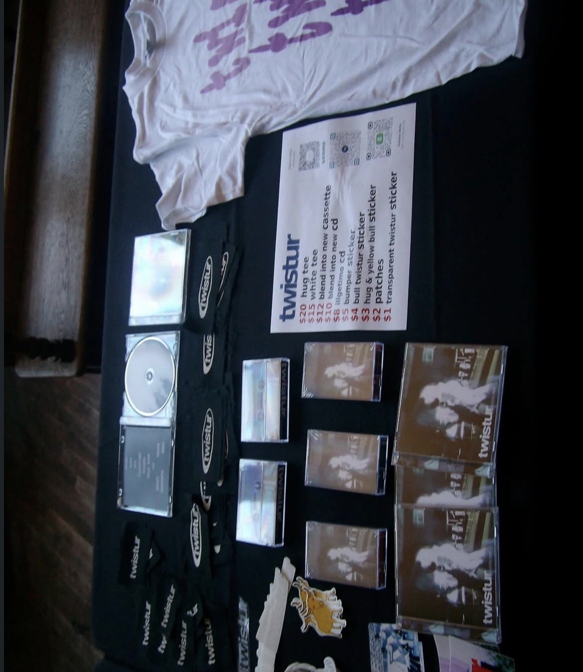TWISTUR merchandise table photograph